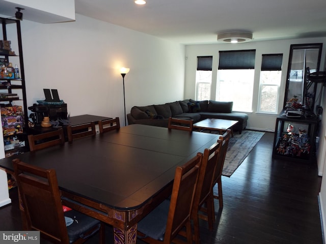 dining room featuring dark hardwood / wood-style flooring