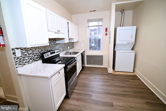 kitchen featuring white cabinets, electric range, dark hardwood / wood-style floors, and sink