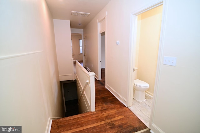 hall with dark hardwood / wood-style floors