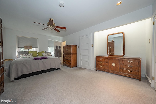 bedroom featuring light carpet, ceiling fan, baseboards, and recessed lighting