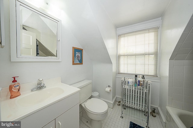 bathroom featuring radiator, toilet, tile patterned flooring, vanity, and a bath