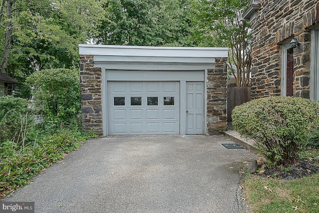 garage with driveway