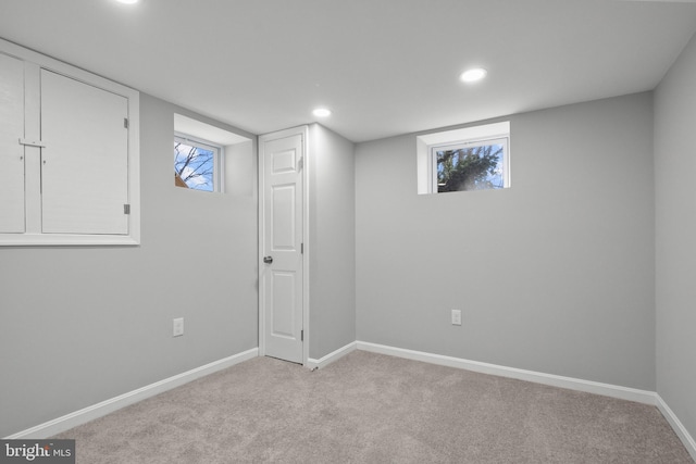 basement with light carpet