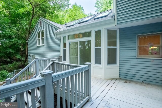 deck featuring a sunroom