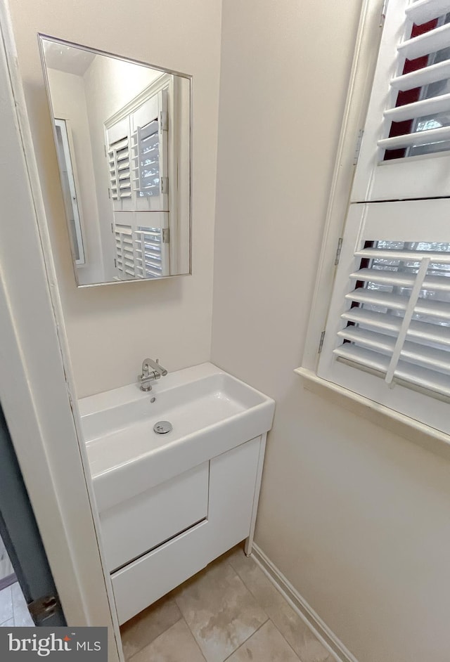 bathroom with tile patterned flooring