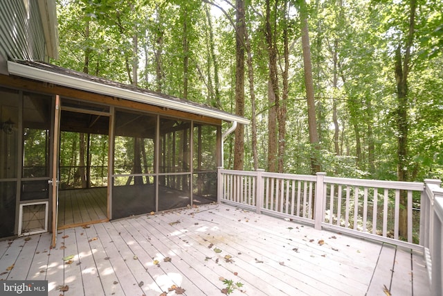 deck with a sunroom