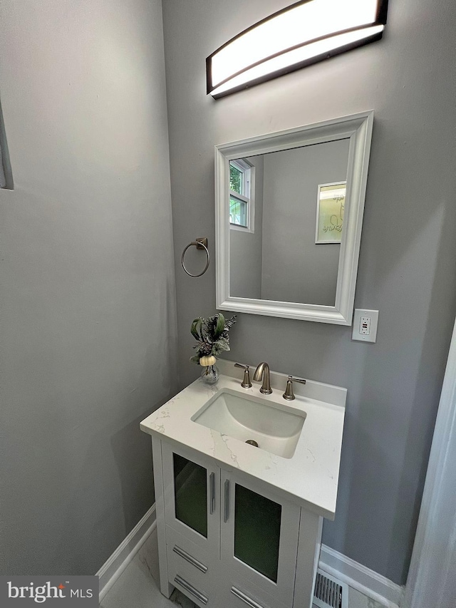 504 Cedarcroft Rd, Baltimore, MD 21212 - bathroom with baseboards and vanity