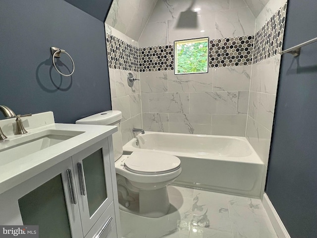 full bathroom with tiled shower / bath combo, toilet, and vanity