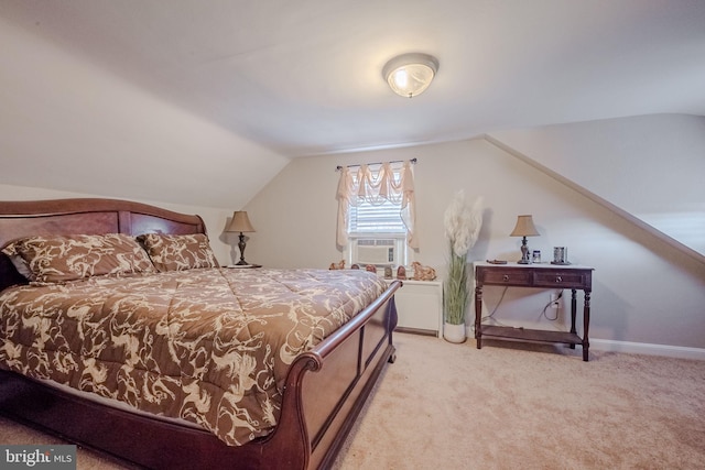 bedroom featuring light carpet, cooling unit, and lofted ceiling