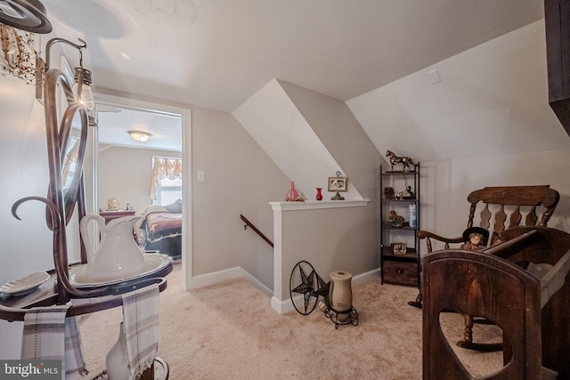 carpeted bedroom featuring vaulted ceiling