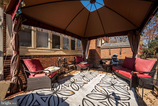 view of patio / terrace featuring a gazebo and outdoor lounge area