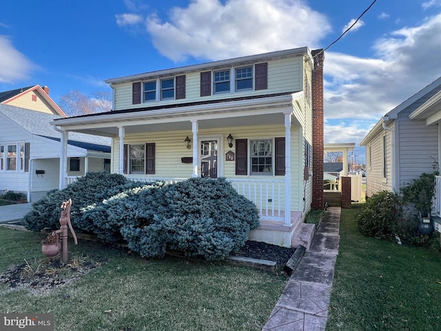 view of front facade with a front lawn