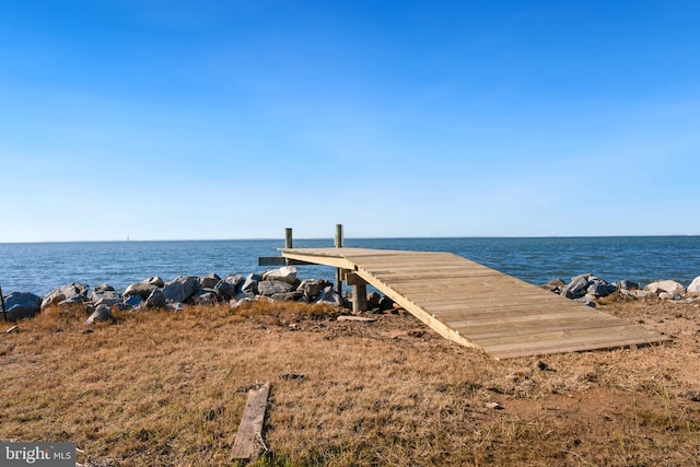 dock area featuring a water view