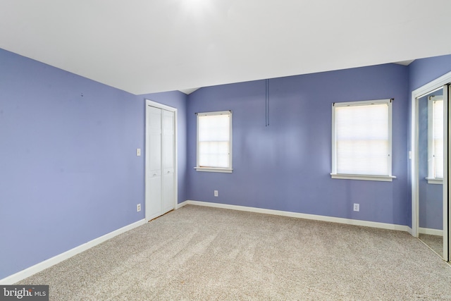 empty room featuring carpet floors