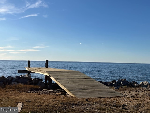 view of dock with a water view