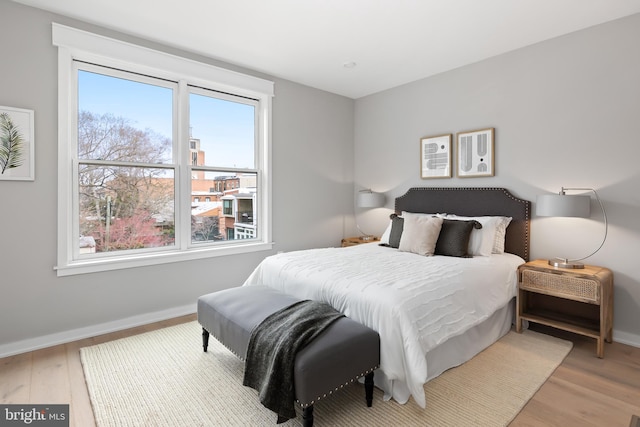 bedroom featuring light wood-type flooring