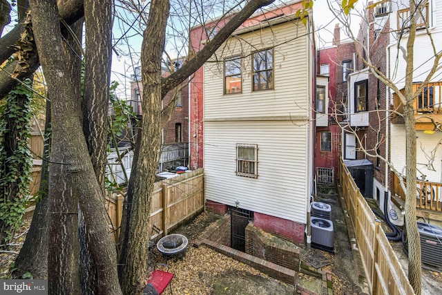 view of side of property with cooling unit