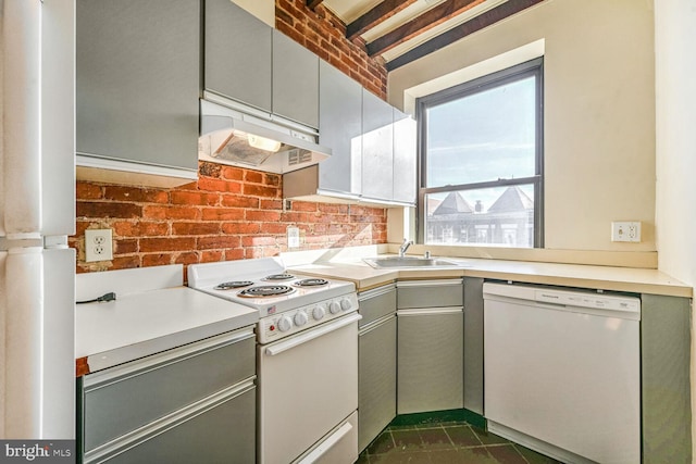 kitchen featuring gray cabinets, decorative backsplash, sink, and white appliances