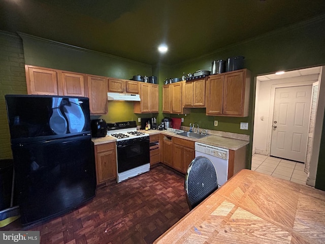 kitchen with sink, dark parquet floors, white appliances, and ornamental molding