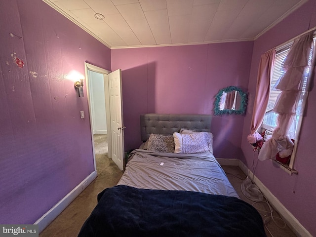 carpeted bedroom with ornamental molding