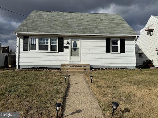 view of front of home with a front yard