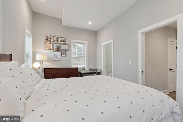 bedroom with wood-type flooring