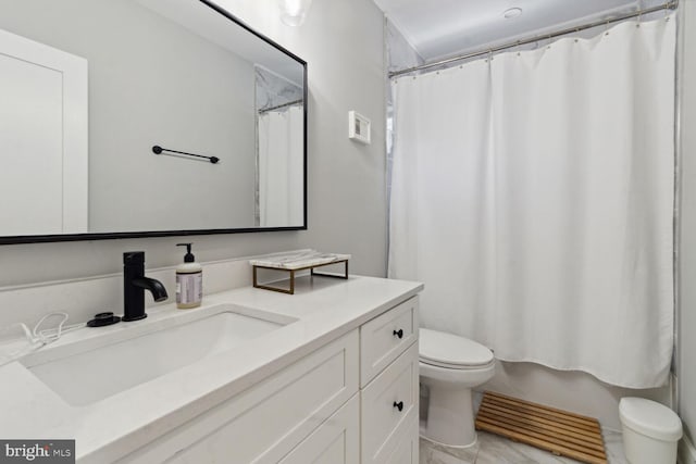 full bathroom featuring shower / bath combination with curtain, vanity, toilet, and tile patterned floors