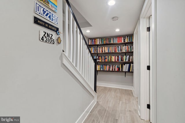 hallway featuring light hardwood / wood-style flooring