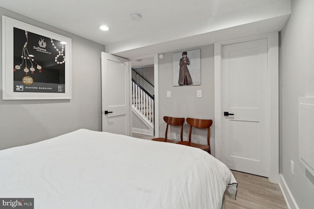 bedroom with light wood-type flooring