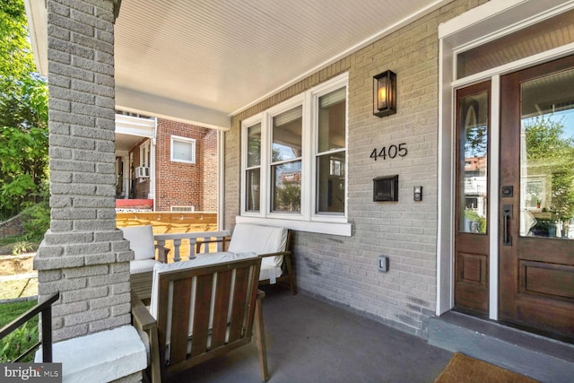 entrance to property with covered porch