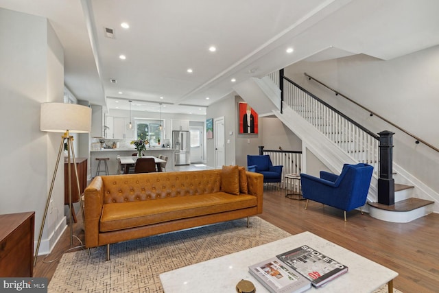 living room with hardwood / wood-style flooring