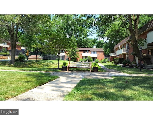 100 E Glenolden Ave Unit A-1, Glenolden, PA 19036 - view of community featuring a lawn and a residential view