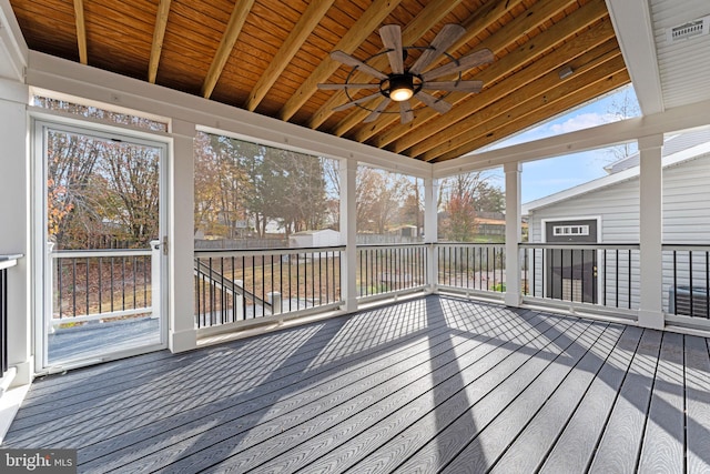 wooden deck with ceiling fan