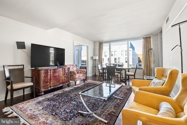 living room with dark wood-type flooring