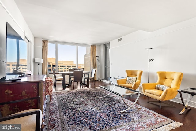 living room with dark wood-type flooring