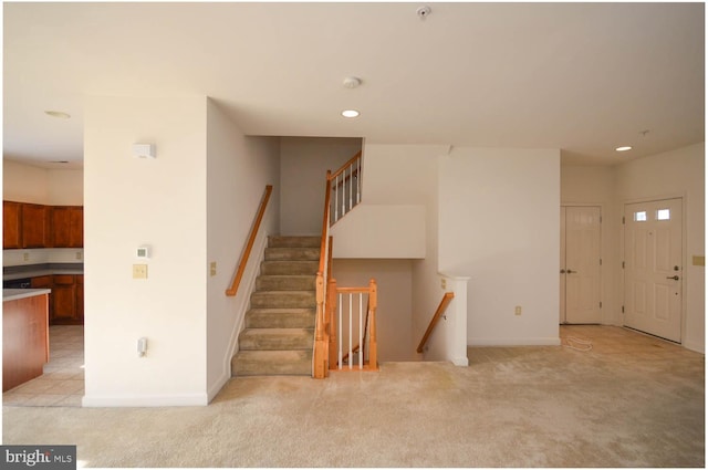 staircase with carpet