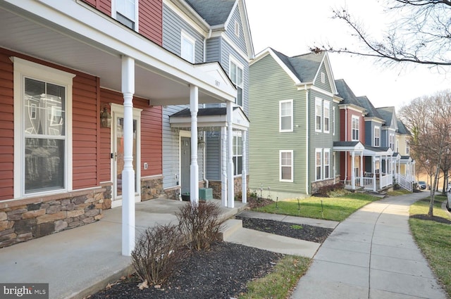 view of home's exterior with a porch