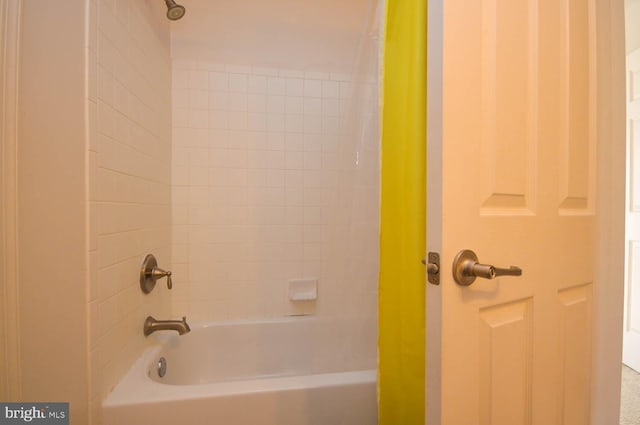 bathroom featuring shower / bath combination with curtain