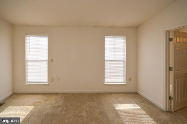 view of carpeted spare room