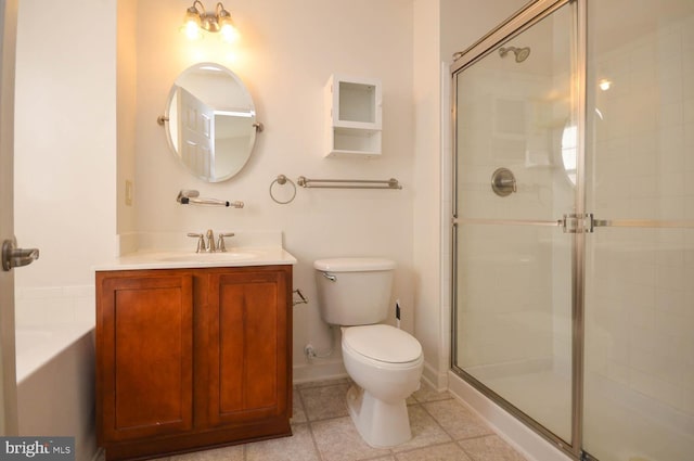 bathroom with vanity, toilet, and a shower with shower door