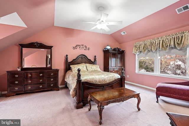 carpeted bedroom with ceiling fan and lofted ceiling