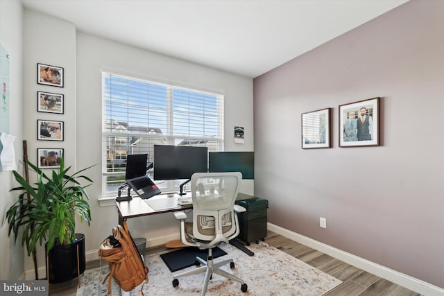 office area with hardwood / wood-style flooring