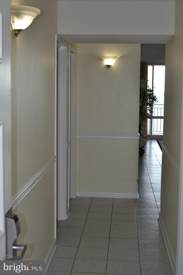 corridor featuring tile patterned floors