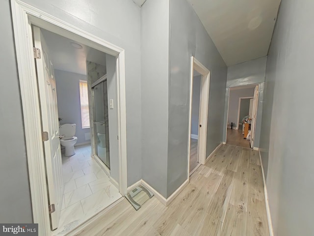 hall featuring light hardwood / wood-style floors