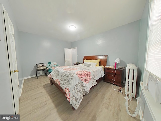 bedroom featuring light hardwood / wood-style floors