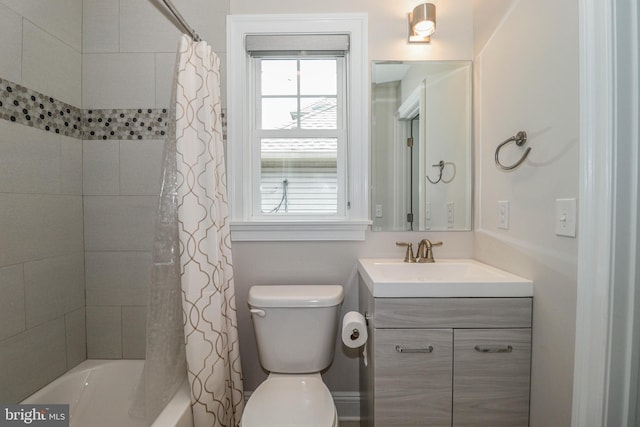 full bathroom with vanity, toilet, and shower / bath combo