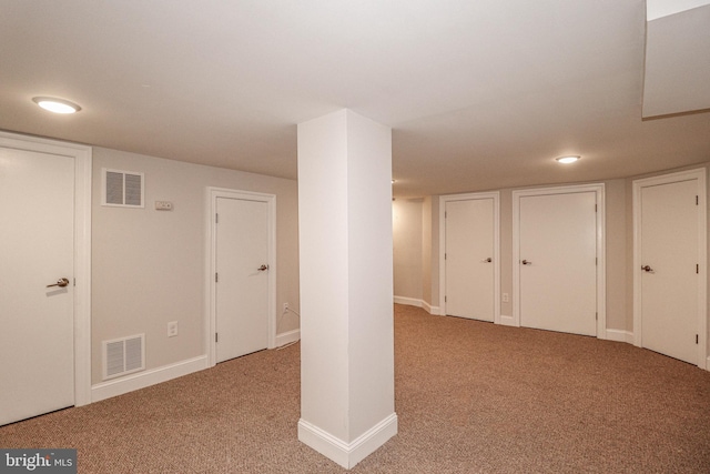 basement with light carpet