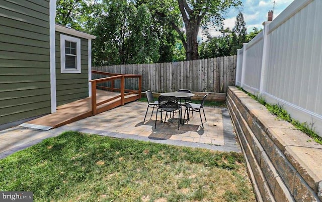 view of patio with a wooden deck