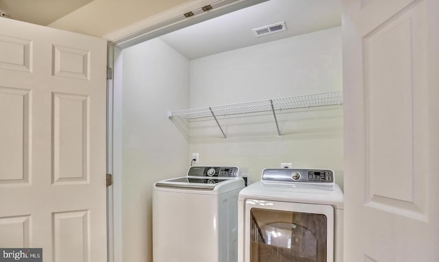 laundry room featuring washer and dryer