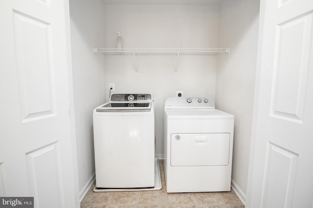 washroom featuring separate washer and dryer